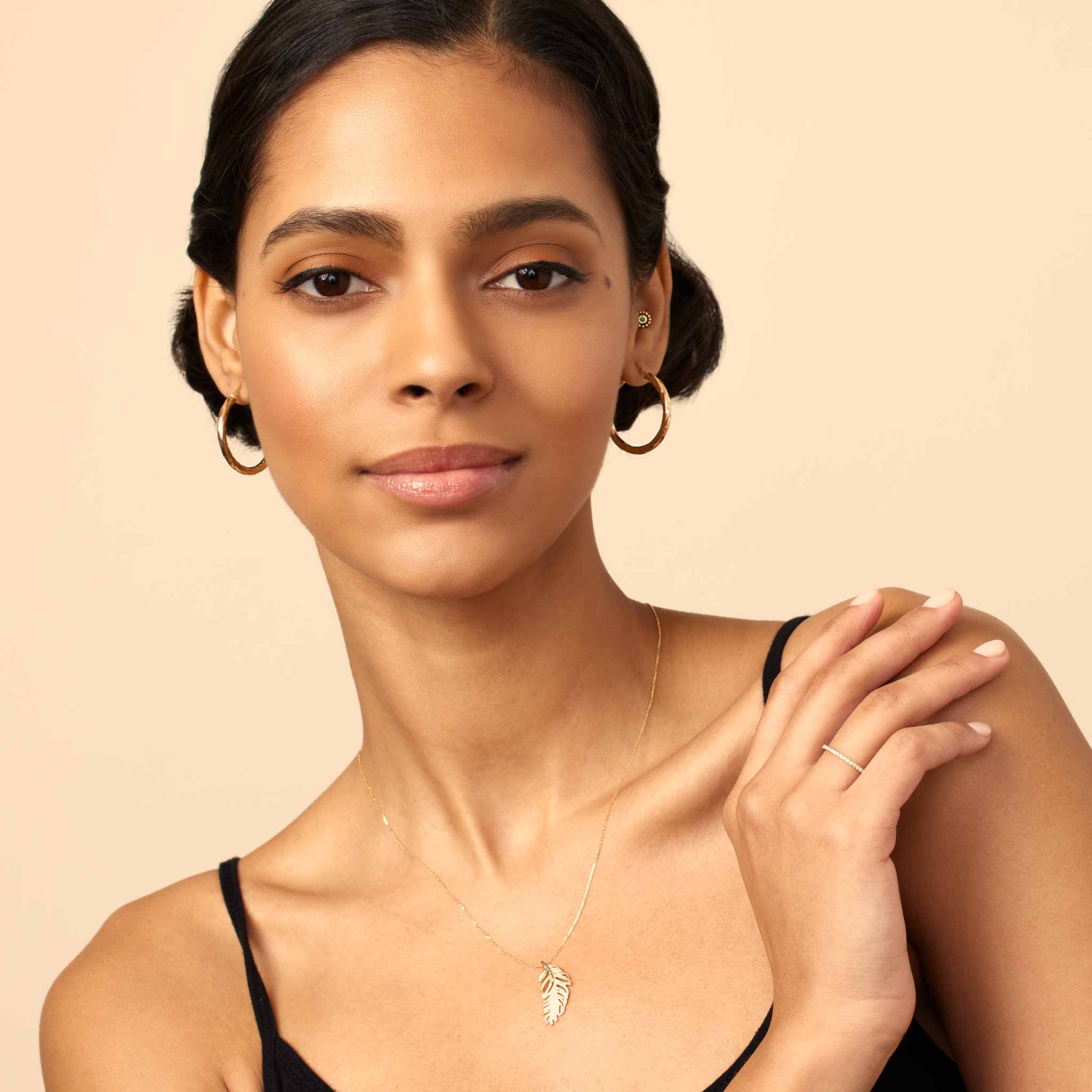 10K Gold Goddess Twisted Hoops