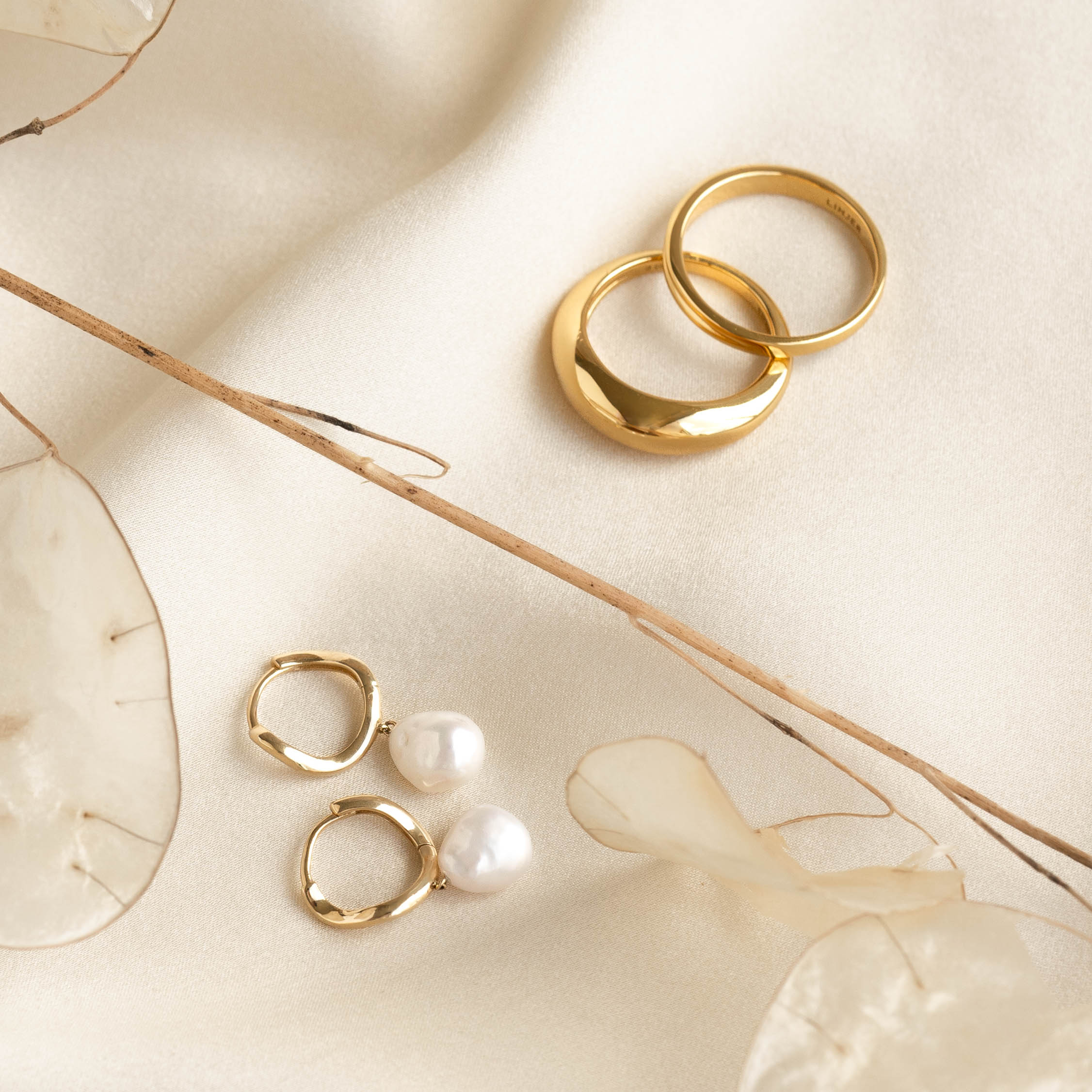 14K Gold Ocean's Whisper Wave Huggie Earrings