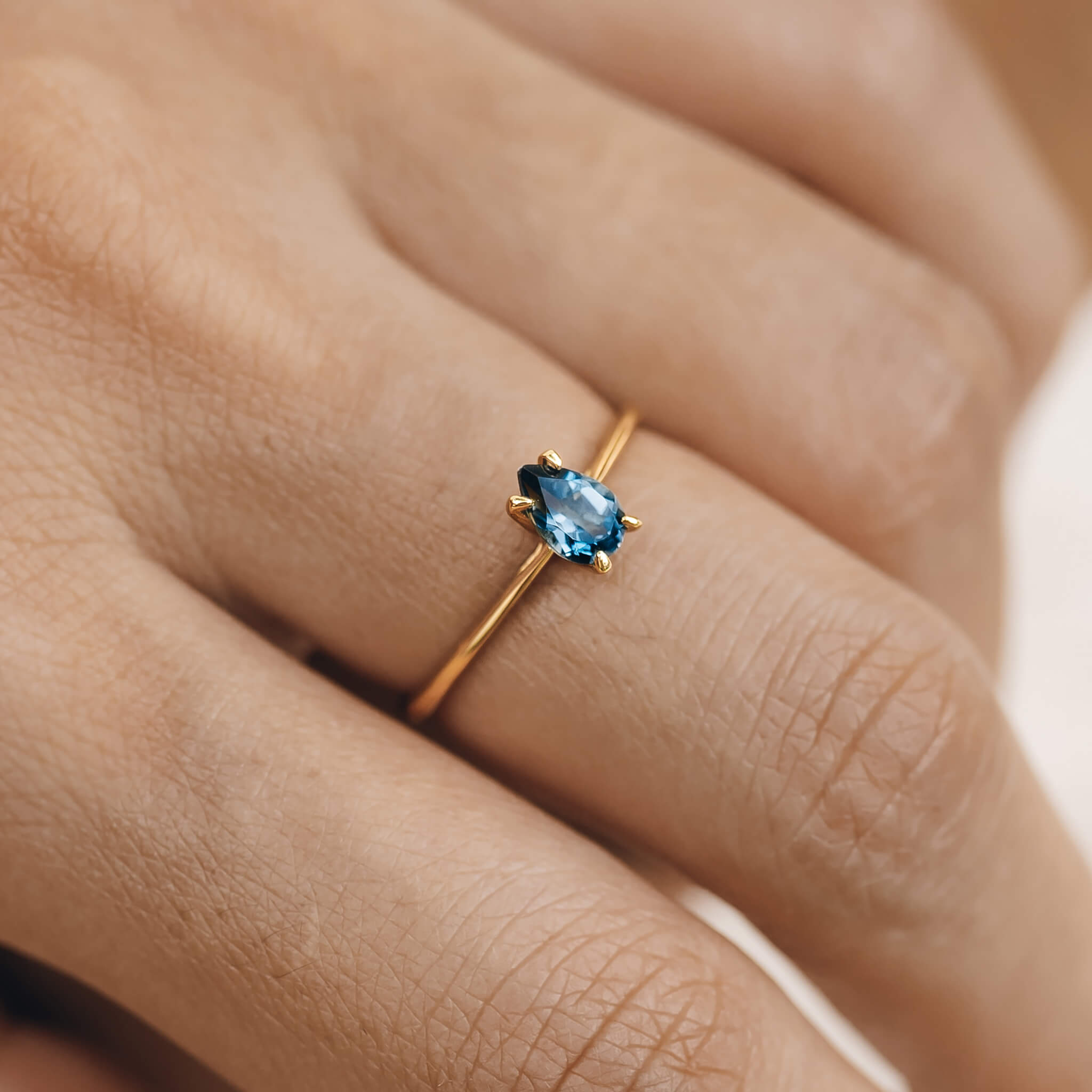 14K Gold Pear-Shaped Blue Topaz Solitaire Ring
